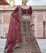 Benign Maroon hand work and heavy embroidered velvet Semi Stitched Bridal Lehenga