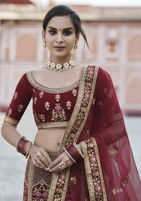 Benign Maroon hand work and heavy embroidered velvet Semi Stitched Bridal Lehenga 2