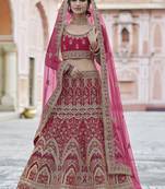 Catching Pink hand work and heavy embroidered velvet Semi Stitched wedding Lehenga