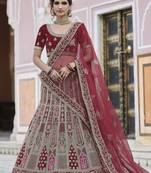Fetching Maroon hand work and heavy embroidered velvet semi stitched Bridal lehenga