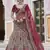 Maroon embroidered velvet semi stitched lehenga