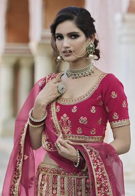 glamourous Pink hand work and heavy embroidered velvet Semi Stitched wedding Lehenga 2