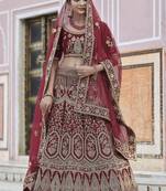 Glamorous Maroon hand work and heavy embroidered velvet Semi Stitched Bridal Lehenga