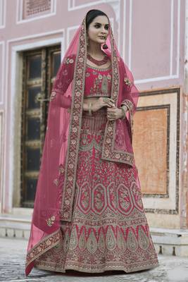 Auspicious Pink hand work and heavy embroidered velvet Semi Stitched wedding Lehenga 1