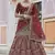 Maroon embroidered velvet semi stitched lehenga