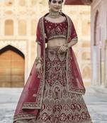 Catching Maroon hand work and heavy embroidered velvet Semi Stitched Bridal Lehenga