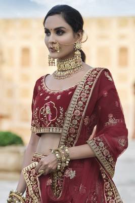 Catching Maroon hand work and heavy embroidered velvet Semi Stitched Bridal Lehenga 2