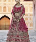 Delightful Pink hand work and heavy embroidered velvet Semi Stitched wedding Lehenga