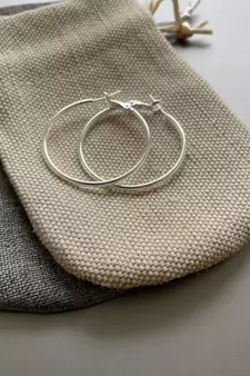 Classic small sized silver hoops to be bold