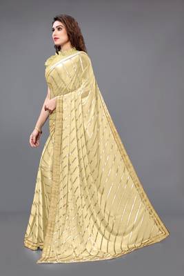 Beige embroidered lycra saree with blouse 4