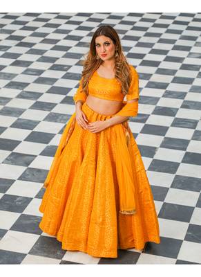 Yellow printed brocade stitched lehenga 1