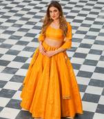 Yellow printed brocade stitched lehenga