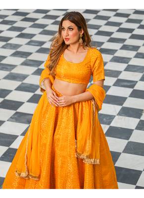 Yellow printed brocade stitched lehenga 2