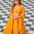 Yellow printed brocade stitched lehenga