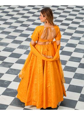 Yellow printed brocade stitched lehenga 3