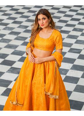 Yellow printed brocade stitched lehenga 4