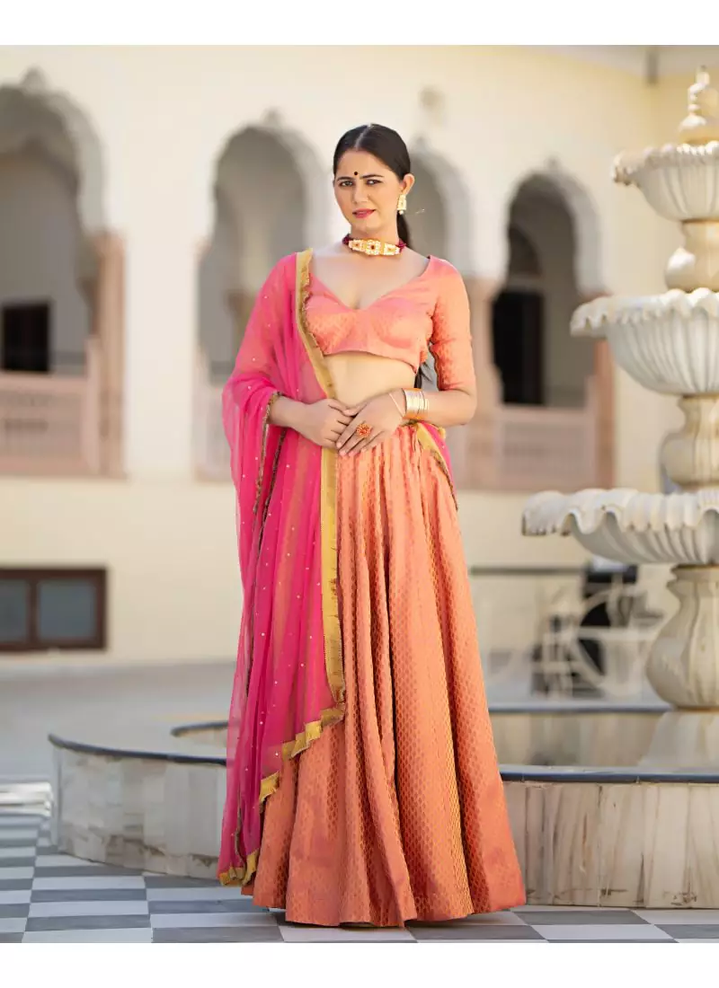 Coral printed brocade stitched lehenga