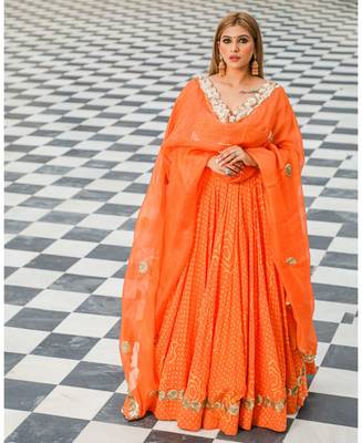 Orange embroidered cotton silk stitched lehenga 1