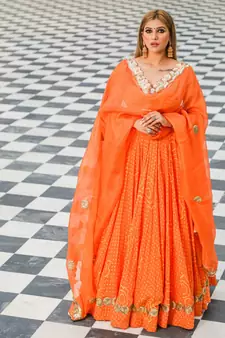 Orange embroidered cotton silk stitched lehenga