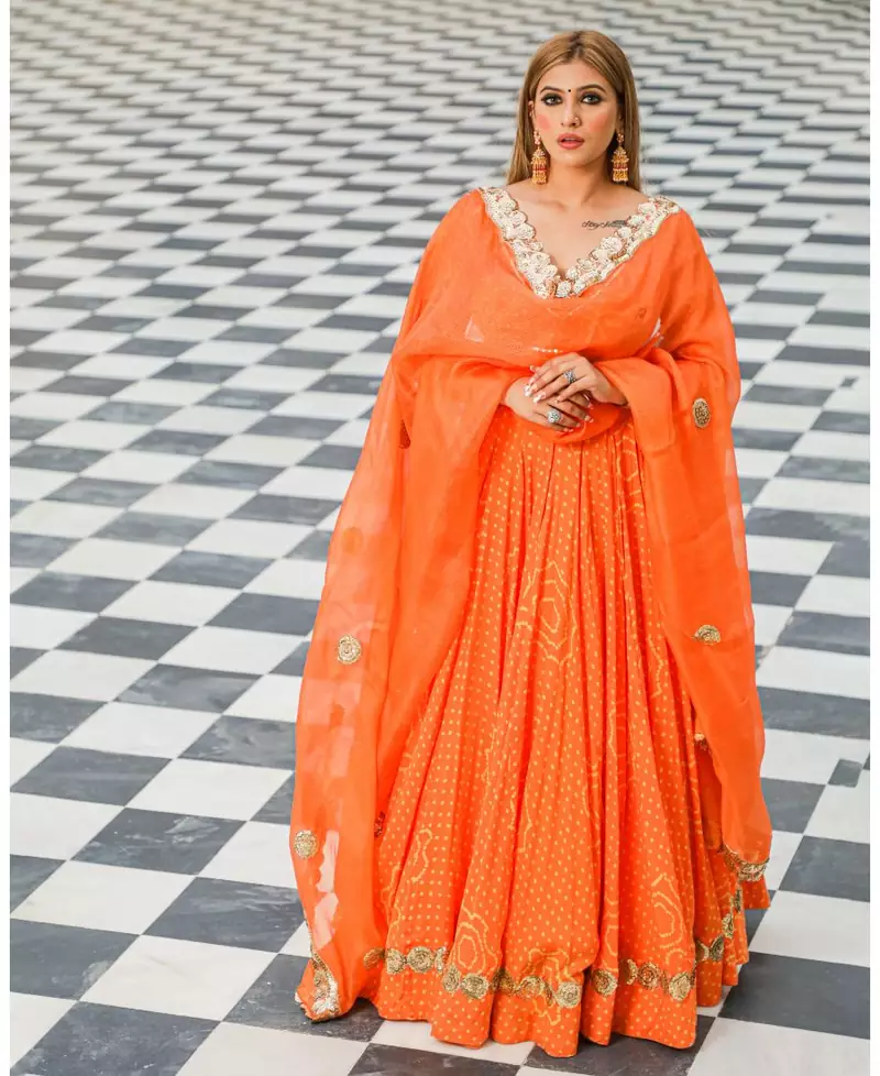 Orange embroidered cotton silk stitched lehenga