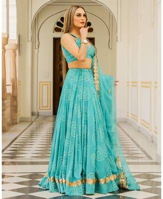 Turquoise embroidered cotton silk stitched lehenga 3