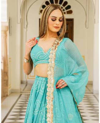 Turquoise embroidered cotton silk stitched lehenga 4
