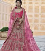 Pink thread embroidery velvet semi stitched lehenga