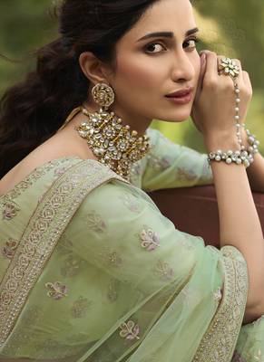 Light-green embroidered organza semi stitched lehenga 4