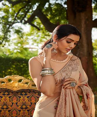 Beige embroidered georgette saree with blouse 3