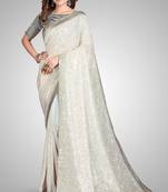 Cream Sequined Embroidered Georgette Fancy Saree With Blouse Piece