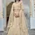 Dutch Cream thread embroidered with foil mirror worked organza semi stitched lehenga