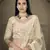 Dutch Cream thread embroidered with foil mirror worked organza semi stitched lehenga