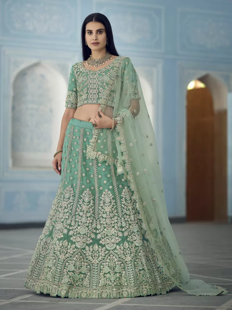 Wintergreen Dream Turquoise Dori, Zari and Sequins embroidered organza Semi Stitched Lehenga choli for wedding