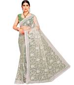 Light Green Super Net Saree With Blouse Piece