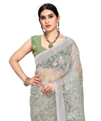 Light Green Super Net Saree With Blouse Piece 5