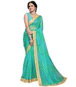 green organza saree with blouse piece
