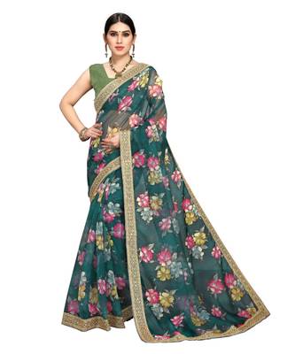 green organza saree with blouse piece 1