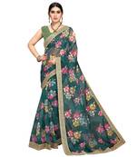 green organza saree with blouse piece