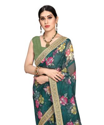 green organza saree with blouse piece 5