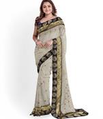 Cream embroidered silk blend saree with blouse