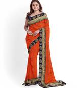 Orange embroidered silk blend saree with blouse
