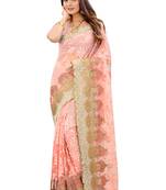 Pink embroidered net saree with blouse