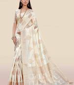 Cream woven banarasi silk saree with blouse