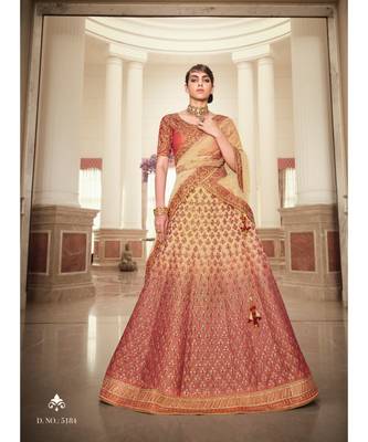 Nakkashi Rust colour shaded lurex handloom silk lehenga having beige colour net dupatta 1