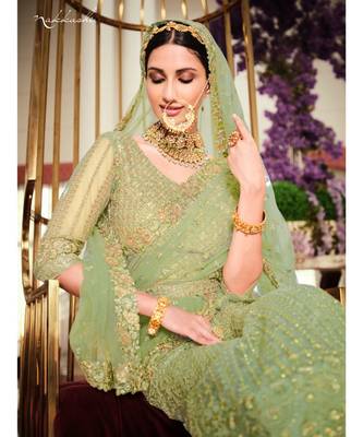 Nakkashi Pista green colour net lehenga having pista green colour net duppata 4