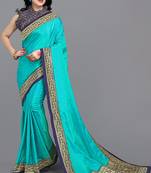 Turquoise woven silk blend saree with blouse