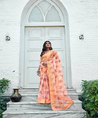 Orange printed organza saree with blouse 1