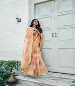 Peach printed organza saree with blouse
