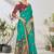 Turquoise woven lycra saree with blouse