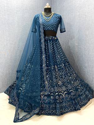 Teal embroidered net  lehenga 2